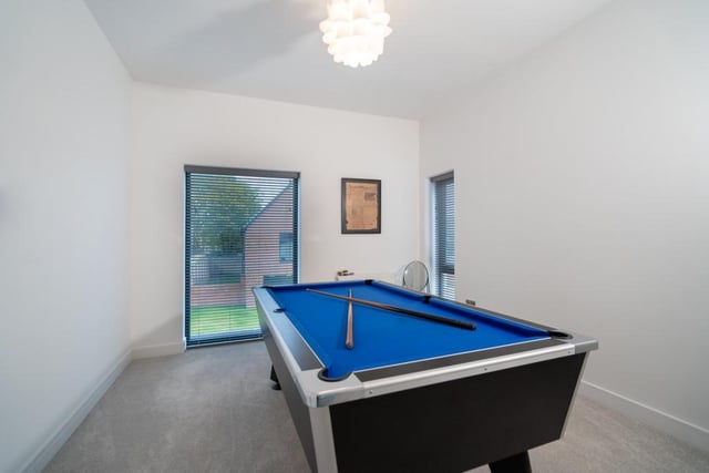There is even enough space for a games room inside the home.
Image by Rightmove.