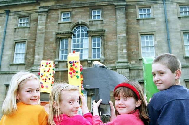 Youngsters made periscopes at the Hall. Natalie Bach, Kimberly Barsby, Melissa and Ben Murray.