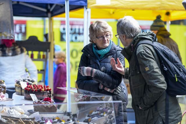 Vegan food fans brave the weather to attend the market on The Moor