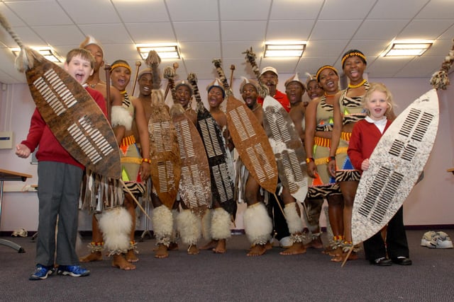 Pupils were having great fun as they learned all about Zulu dancing 11 years ago.