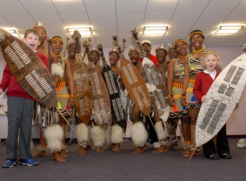 Pupils were having great fun as they learned all about Zulu dancing 11 years ago.