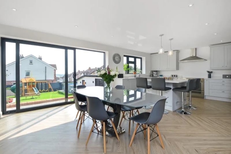 A look at the open plan dining room and kitchen. This four bedroom house in Sea View Road, Drayton is on sale for £725,000.