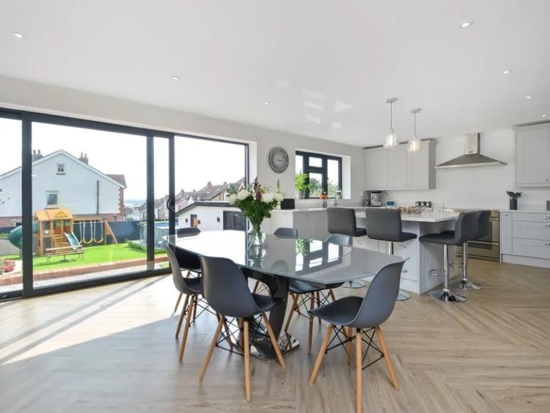 A look at the open plan dining room and kitchen. This four bedroom house in Sea View Road, Drayton is on sale for £725,000.