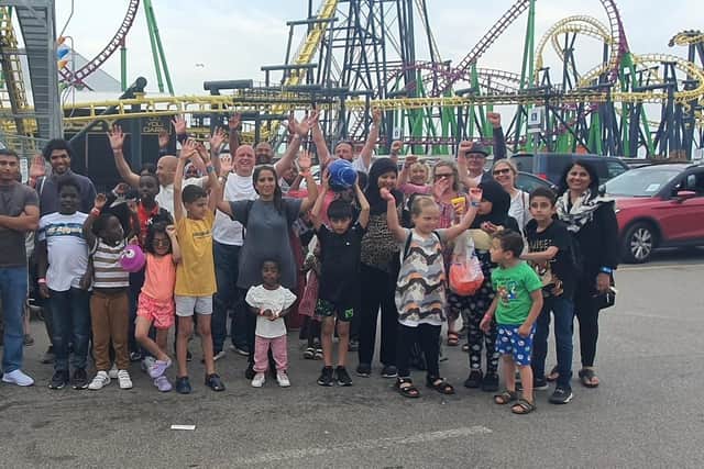 Big-hearted Sheffield taxi drivers took Ukrainians to the seaside on a trip which included fish and chips and tickets to Fantasy Island at Ingoldmells.