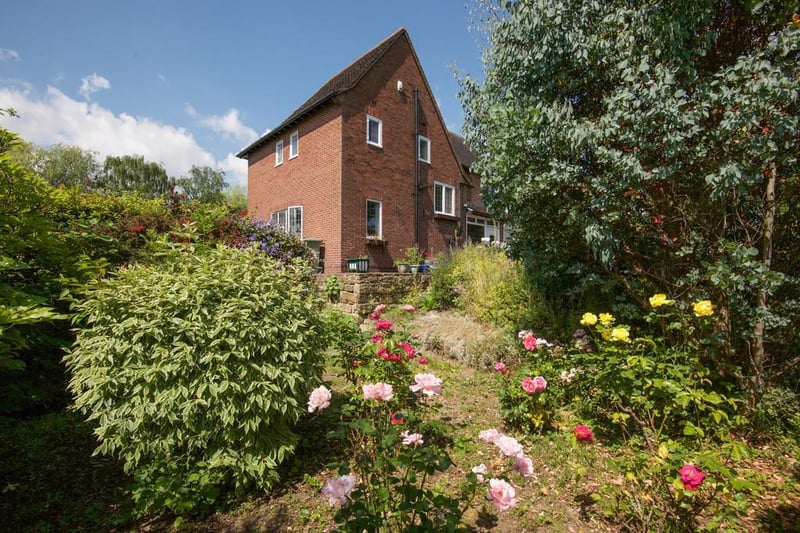 The property boasts a substantial, landscaped rear garden.