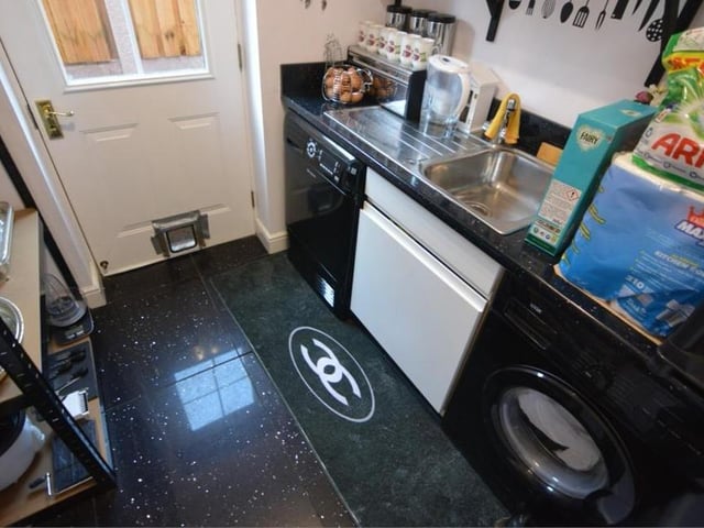 A utility room always comes in handy - and this one at Springwood Drive is no exception. It is fitted with base units and worktops, with a sink basin, space and plumbing for appliances, such as a washing machine, and storage space.
