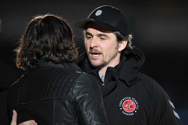 Joey Barton's side are among clubs who have publicly revealed their desire to continue. Curtailing would guarantee a play-off spot, but deny them a chance to earn automatic promotion. Prediction: Resume. (Photo by Alex Davidson/Getty Images)