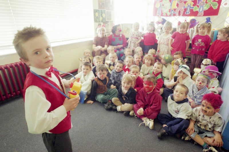 Here is a scene from Quarry View Infants School on Red Nose Day in 1997 and Grant Wake, front, was dressed as a photographer as he posed for this picture with fellow pupils.