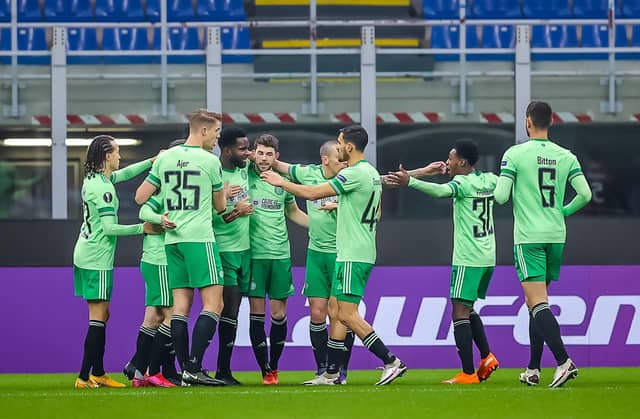 Odsonne Edouard celebrates with his team-mates after putting Celtic 2-0 up. Picture: Fabrizio Carabelli/PA Wire.