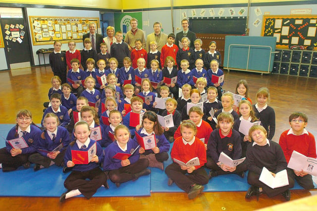 The St Helen's and St Bega's Primary School choirs were in the picture 13 years ago. Can you spot someone you know?