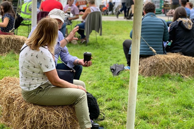 In between browsing the stalls, visitors enjoyed food and drink sat in the sunshine, listening to live music