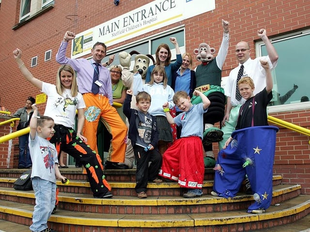 Wallace & Gromit pictured at the Sheffield Children's Hospital Wrong Trousers Day on June 1, 2006, with children and staff Christina Graf, Simon Athey, Paul Knight, Laura Densen and Macaulay Hollwood