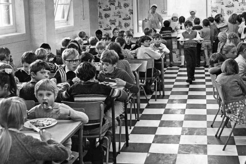 Barnes Road Junior School's dining room is packed in 1970 with hungry children enjoying their dinner. What was your favourite school meal?