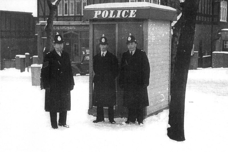 Police officers on duty in Ettrick Grove in the winter of 1963. Lynn Craggs reminisced that children played in the snow and used dustbin lids as sledges if they didn't have a proper sledge of their own.
