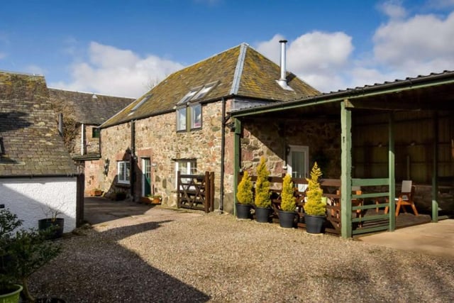 The Bothy is a two bedroom cottage created out of former stables - on the ground floor are two double bedrooms (one of which is an en suite), and on the first floor is an open plan sitting room and kitchen
