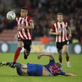 Ravel Morrison of Sheffield United skips past Laurens De Bock of Sunderland during the Carabao Cup match at Bramall Lane, Sheffield. Picture date: 25th September 2019. Picture credit should read: Simon Bellis/Sportimage