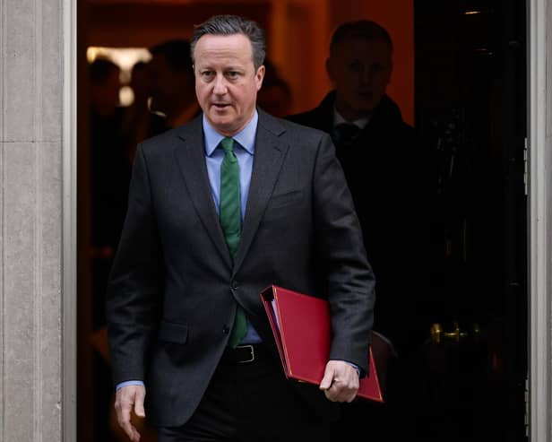 Foreign Secretary David Cameron leaves number 10, Downing Street. (Photo by Leon Neal/Getty Images)