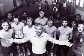 Brendan Ingle inside his gym with some of his fighters.