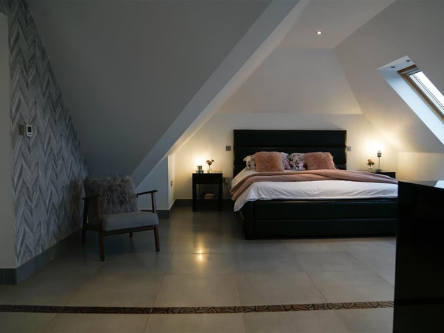 The master bedroom has its own floor, with an en-suite and a dressing area in the bedroom.