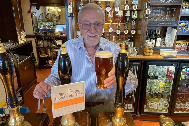 David Mountney, landlord of the Blacksmiths Arms, in Stranton, Hartlepool, pulls a pint of The Blacksmiths' Bicentennial Brew to mark the pub's 200th anniversary.