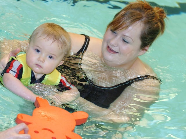 Joanna Clayton, and nine-month-old son Reuben, of Arksey, enjoy Swim Tots at Doncaster Deaf College in 2008