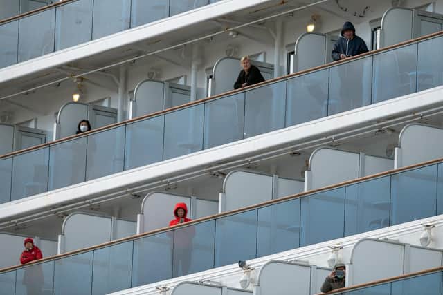 Passengers on board the coronavirus-hit Diamond Princess cruise ship off Japan (pic: Carl Court/Getty Images)