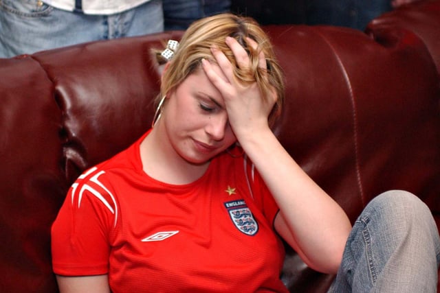 The expression on this fan's face says it all as England fall short against Portugal.