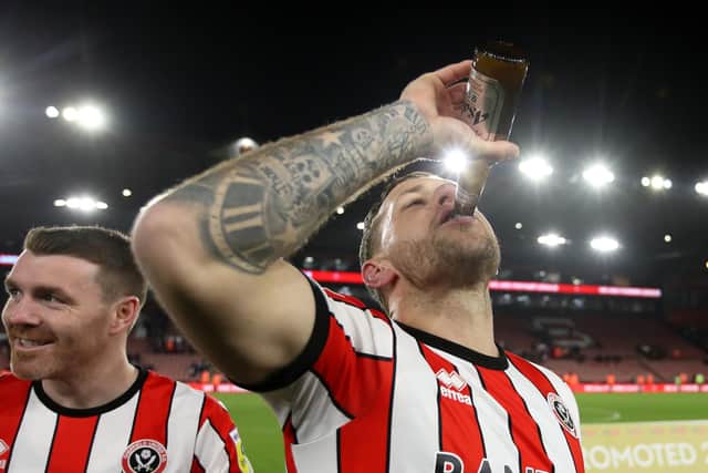 Sheffield United captain Billy Sharp gets the promotion party started: George Wood/Getty Images