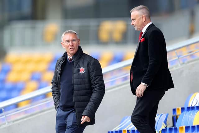 Charlton Athletic owner Thomas Sangaard with manager Nigel Adkins.