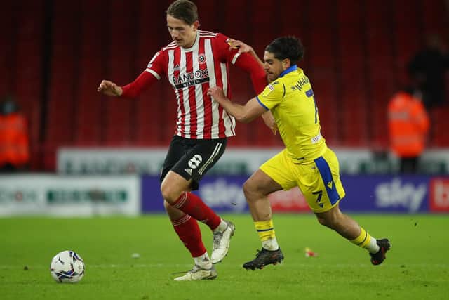 Reda Khadra, who spent last seaosn on loan at Blackburn Rovers from Brighton and Hove Albion, tussles with Sheffield United's Sander Berge: Simon Bellis / Sportimage