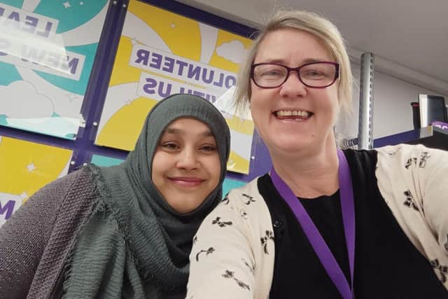 Volunteer Koyfa Begum with manager of Scope charity shop on Division Street, Teresa Nelson.