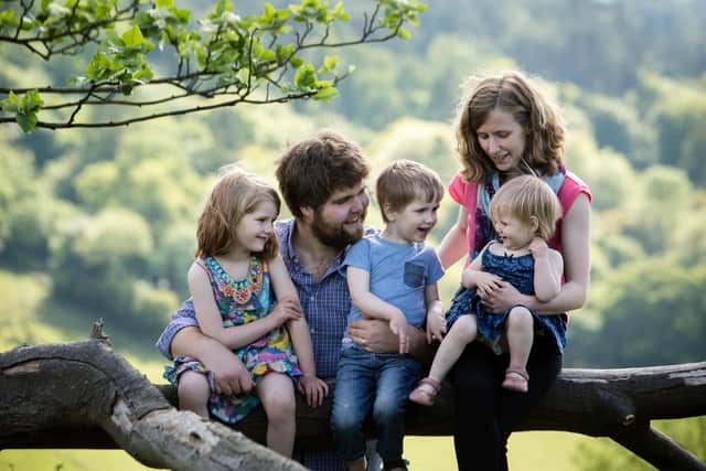 Zoe and Josh Powell with three of their children. Photo: Sarah Mak Photography