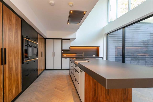 104 Leeds Road - the kitchen and breakfast bar boast large windows looking out over the back.