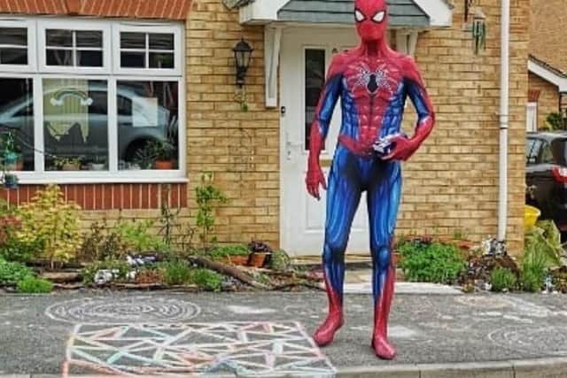 The Sheffield Spiderman was spotted handing out Easter eggs to children in the S6 area (Picture: @have_a_go_cosplayer)