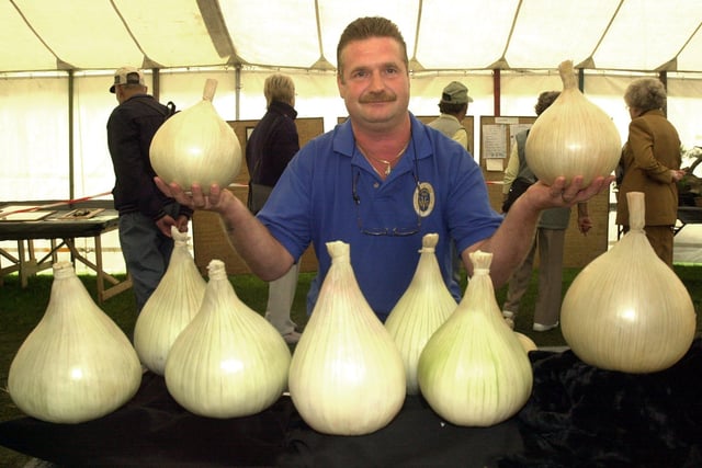 Sheffield Fayre, Norfolk Park, 2004. Derek Neumann (correct) with his prizewinning onions in the Horticultural section.