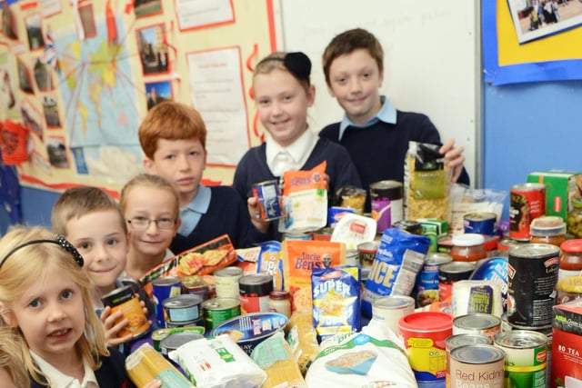 Children from Barnburgh primary school collected food parcels and products as part of their Harvest Festival celebrations which are being donated to a food bank. Pictured are back l-r Joshua Taylor, five, Megan Seward, ten, Luke DiManna, six, Chloe Elliott-Hudson, seven, Harry Hubberd, eight, Kerys Naughton, nine