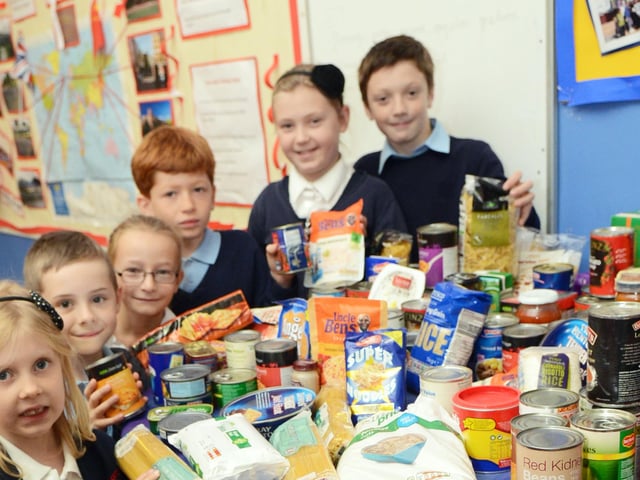 Children from Barnburgh primary school collected food parcels and products as part of their Harvest Festival celebrations which are being donated to a food bank. Pictured are back l-r Joshua Taylor, five, Megan Seward, ten, Luke DiManna, six, Chloe Elliott-Hudson, seven, Harry Hubberd, eight, Kerys Naughton, nine