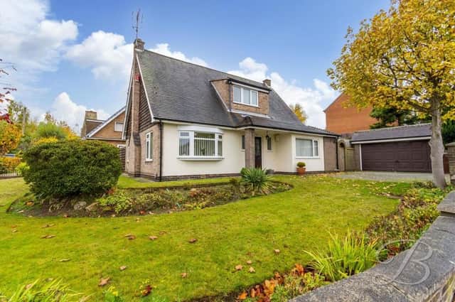 The three-bedroom chalet-style bungalow on Faraday Road in Mansfield, close to Berry Hill Park. It is on the market with estate agents Buckley Brown, who are inviting offers of more than £300,000.