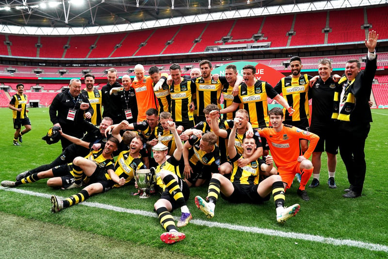 Hebburn Town players and staff celebrate with the Buildbase FA Vase 2019/20 Trophy after the Final at Wembley Stadium, London. P