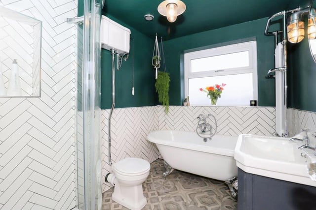 With a freestanding bath and walk-in shower, this is a lovely bathroom.