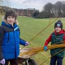 Zach Oxtoby (left)  aged 10, from Parkgate, Rotherham, and Theo Wiseman, aged 10, of Sheffield, preparing to make a willow walk in the gardens at Wentworth Woodhouse
