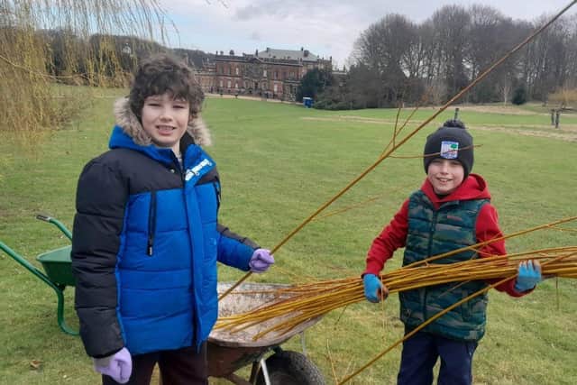 Zach Oxtoby (left) aged 10, from Parkgate, Rotherham, and Theo Wiseman, aged 10, of Sheffield, preparing to make a willow walk in the gardens at Wentworth Woodhouse