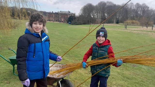 Zach Oxtoby (left)  aged 10, from Parkgate, Rotherham, and Theo Wiseman, aged 10, of Sheffield, preparing to make a willow walk in the gardens at Wentworth Woodhouse
