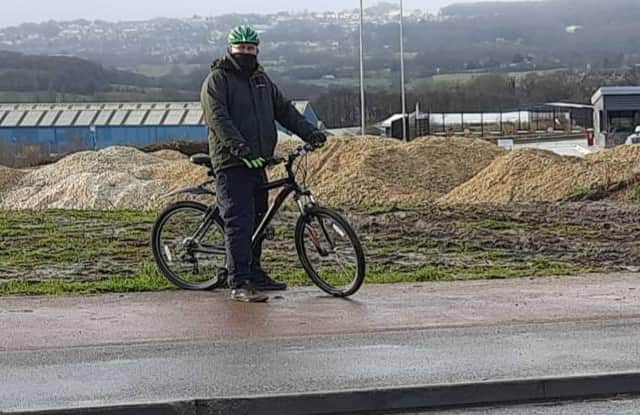 Cyclist Dennis Patton has campaigned for completion of a 200m section, off Cowley Way, which he says has never been surfaced and is covered in ruts and muddy puddles.