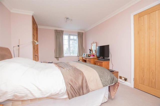 This bedroom is a nice size, offering plenty of space as well as comfort. Good views too from the window.