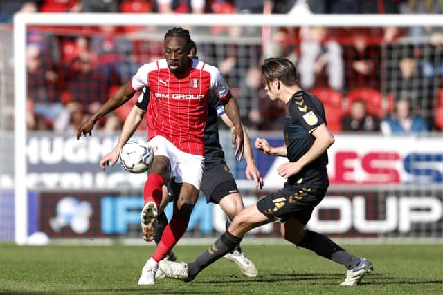 Charlton Athletic's George Dobson (right) and Rotherham United's Freddie Ladapo battle for the ball during the Sky Bet League One match at the AESSEAL New York Stadium. Richard Sellers/PA Wire.
