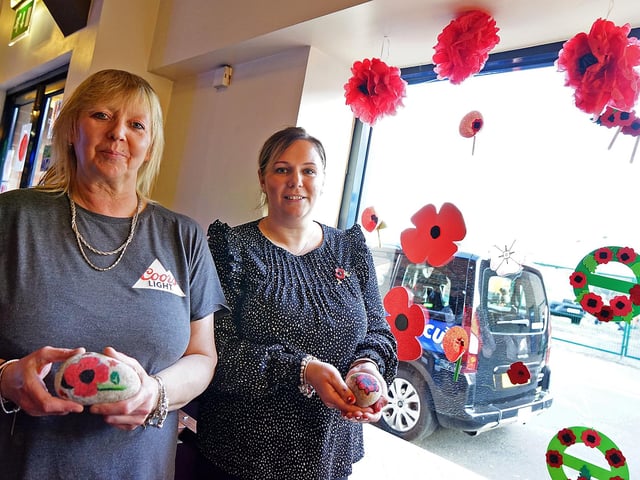 Kate Nott, duty manager, and Lisha Hodson, pictured with the rocks painted by Leamington Primary Academy pupils