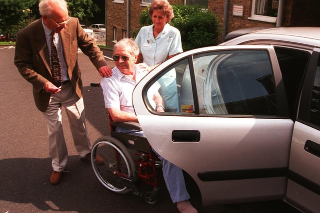 Pictured at St Lukes Hospice, Sheffield, where volunteer  Gordon English is seen with Patient Walter Lindley who had been out for a mornings outing in 1998
