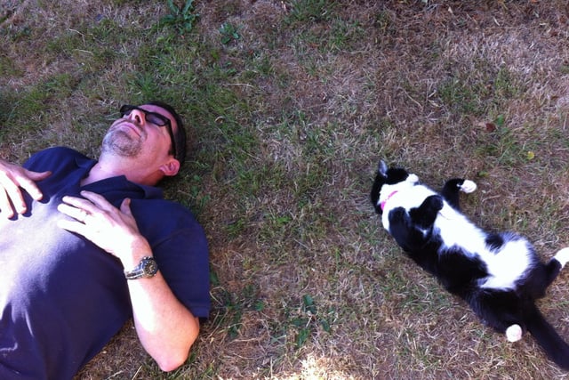 Mark Lawrence chilling in the garden with Elsie the cat, after a hard day's work in Fareham back in 2013.