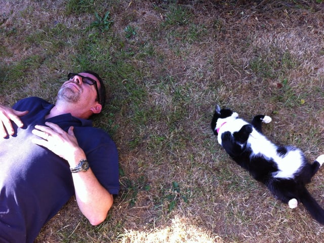 Mark Lawrence chilling in the garden with Elsie the cat, after a hard day's work in Fareham back in 2013.